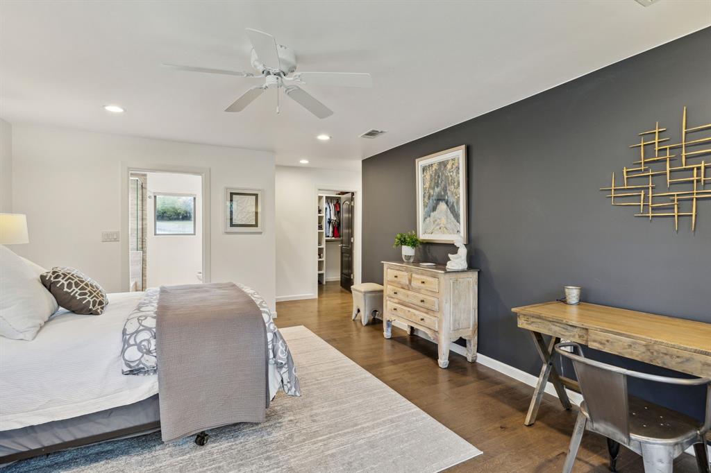 7342 Briar Road Azle, TX 76020 - Photo 15 of 40 a bedroom with a bed and wooden floor