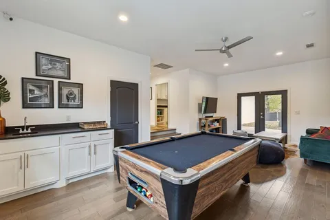 a kitchen with a stove and a sink