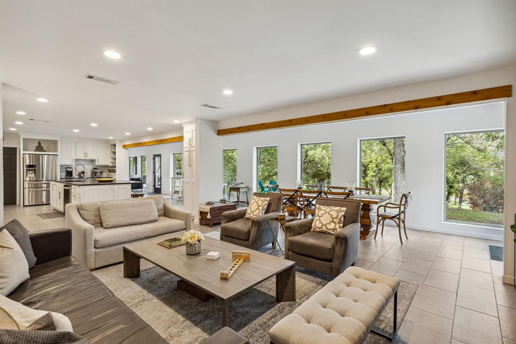 7342 Briar Road Azle, TX 76020 - Photo 3 of 40 a living room with furniture and a large window