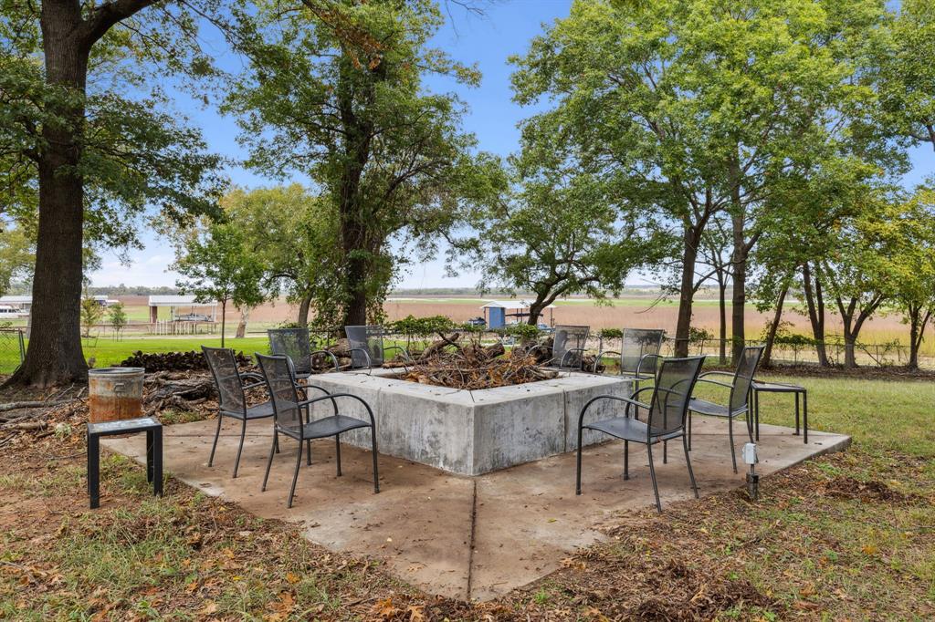 7342 Briar Road Azle, TX 76020 - Photo 34 of 40 a view of a backyard with sitting area