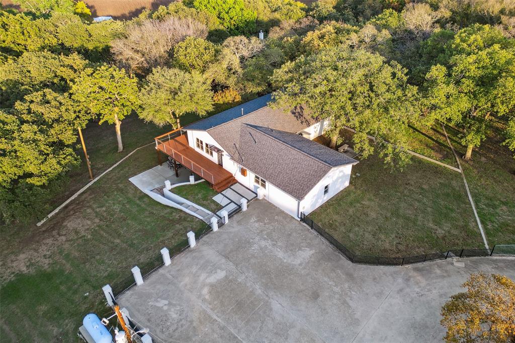 7342 Briar Road Azle, TX 76020 - Photo 36 of 40 an aerial view of a house with a yard