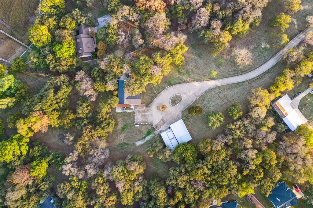 7342 Briar Road Azle, TX 76020 - Photo 37 of 40 an aerial view of a house with swimming pool and outdoor seating