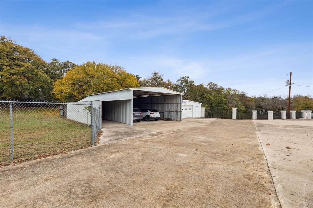7342 Briar Road Azle, TX 76020 - Photo 39 of 40 a house with a yard