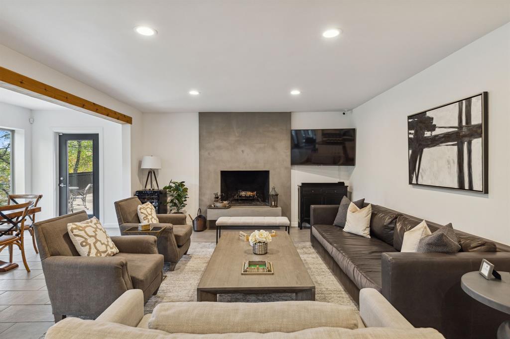 7342 Briar Road Azle, TX 76020 - Photo 8 of 40 a living room with furniture and a fireplace