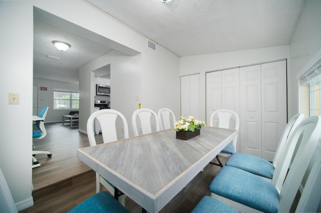 107 Lighthouse Road North Jacksonville, FL 32225 - Photo 21 of 43 a view of a dining room with furniture and wooden floor