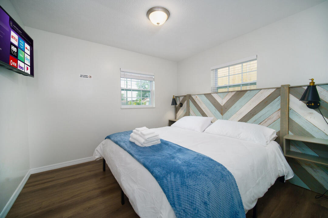 107 Lighthouse Road North Jacksonville, FL 32225 - Photo 5 of 43 a bedroom with a bed and wooden floor
