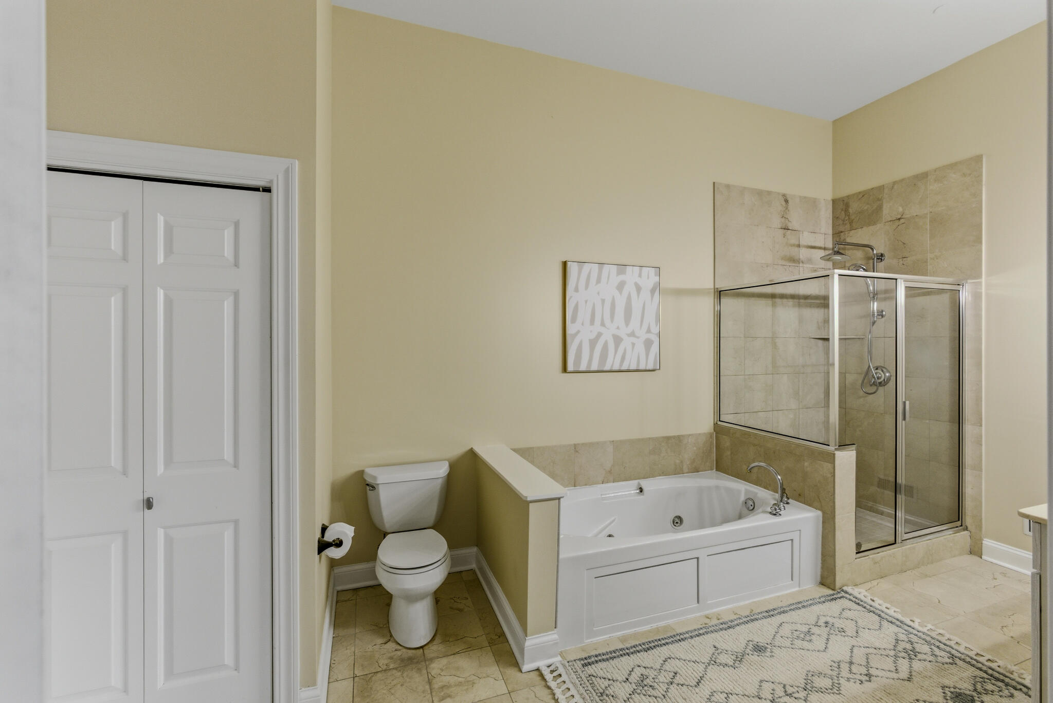 1888 North Water Street, Unit 101 Milwaukee, WI 53202 - Photo 16 of 26 Master Bathroom with laundry in the closet!