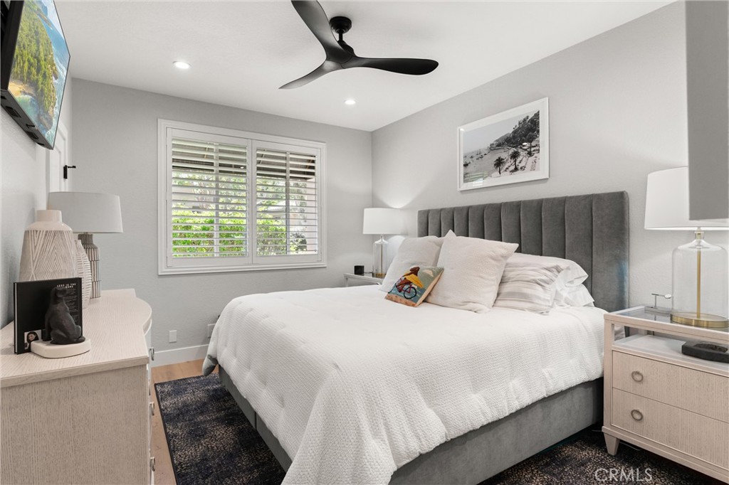 26 Sunbridge Place Dana Point, CA 92629 - Photo 15 of 39 a bedroom with a bed and a flat screen tv
