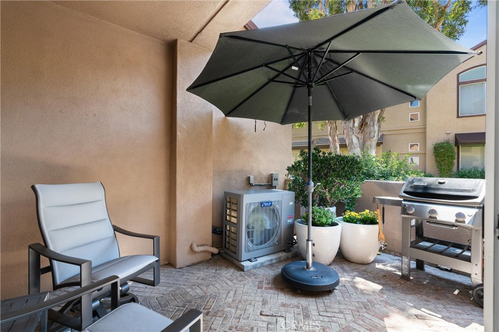 26 Sunbridge Place Dana Point, CA 92629 - Photo 21 of 39 a backyard of a house with table and chairs