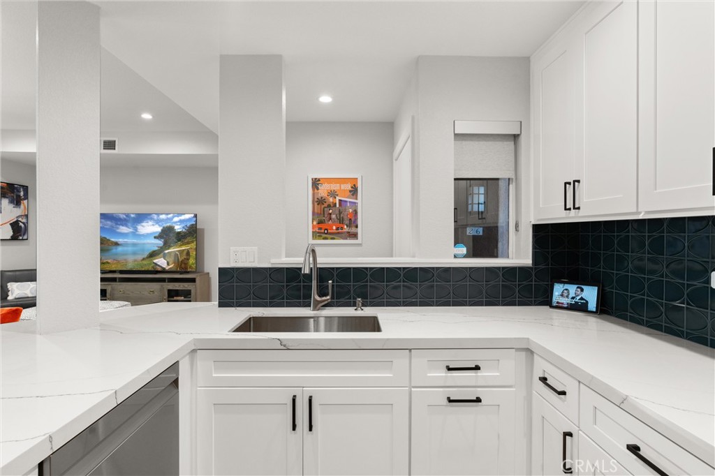 26 Sunbridge Place Dana Point, CA 92629 - Photo 10 of 39 a bathroom with a sink and a mirror