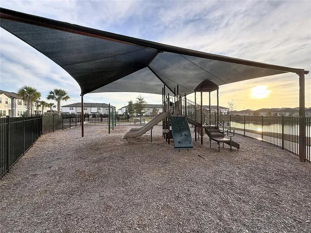 a view of outdoor space with chairs
