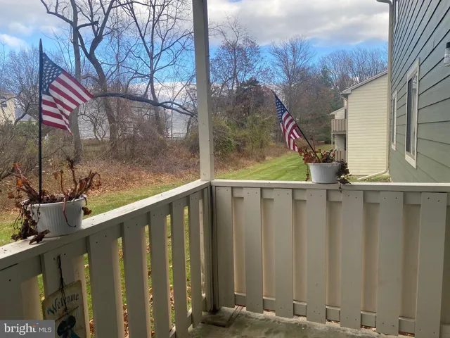 a view of a street from a balcony