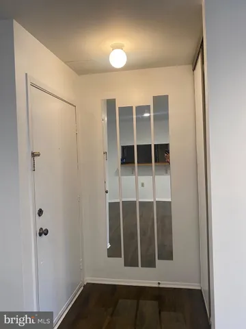 a view of empty room with windows