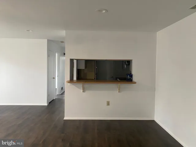 a living room with a flat screen tv