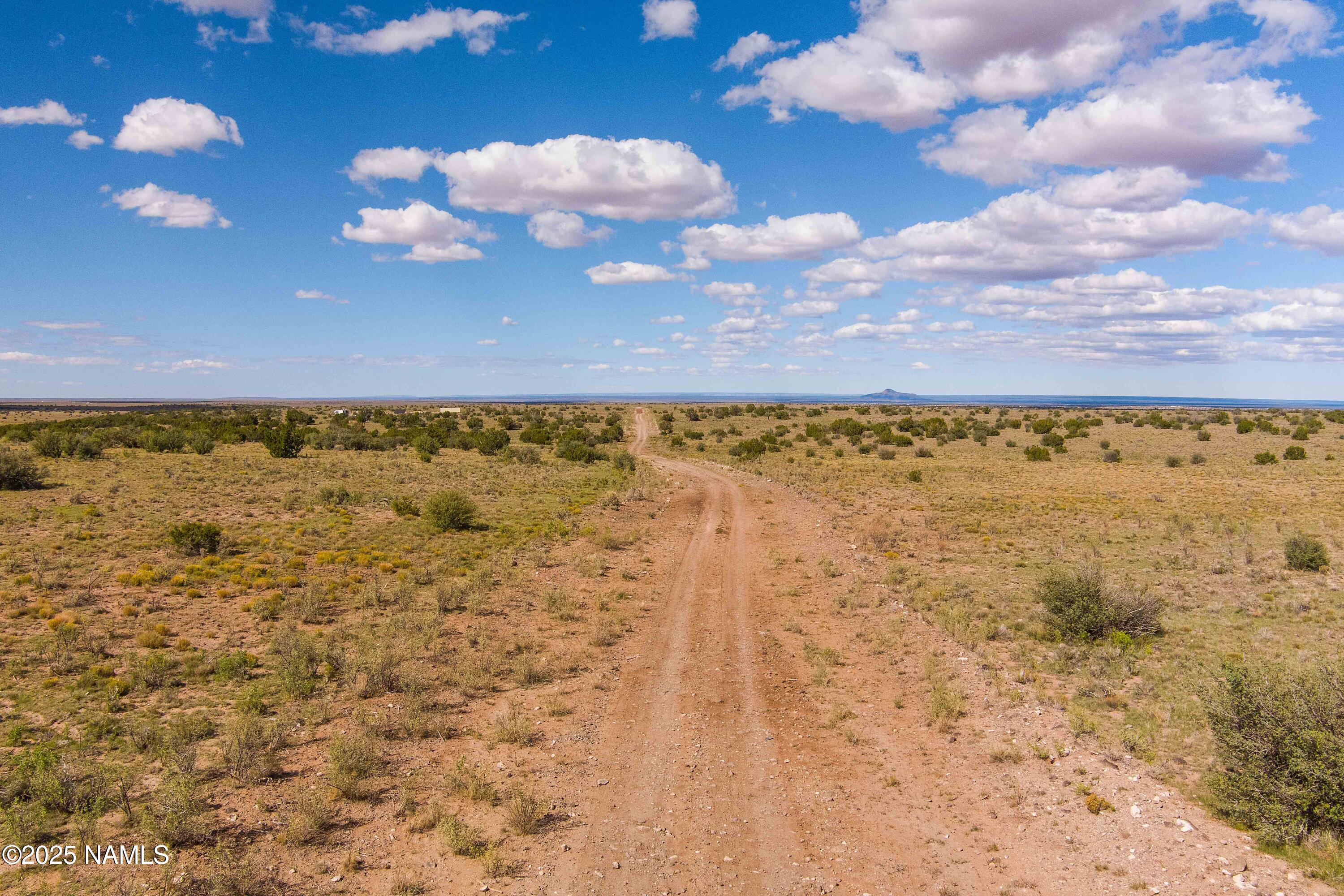 7563 Lariat Road Williams, AZ 86046 - Photo 26 of 34 a view of a brick wall with an ocean view