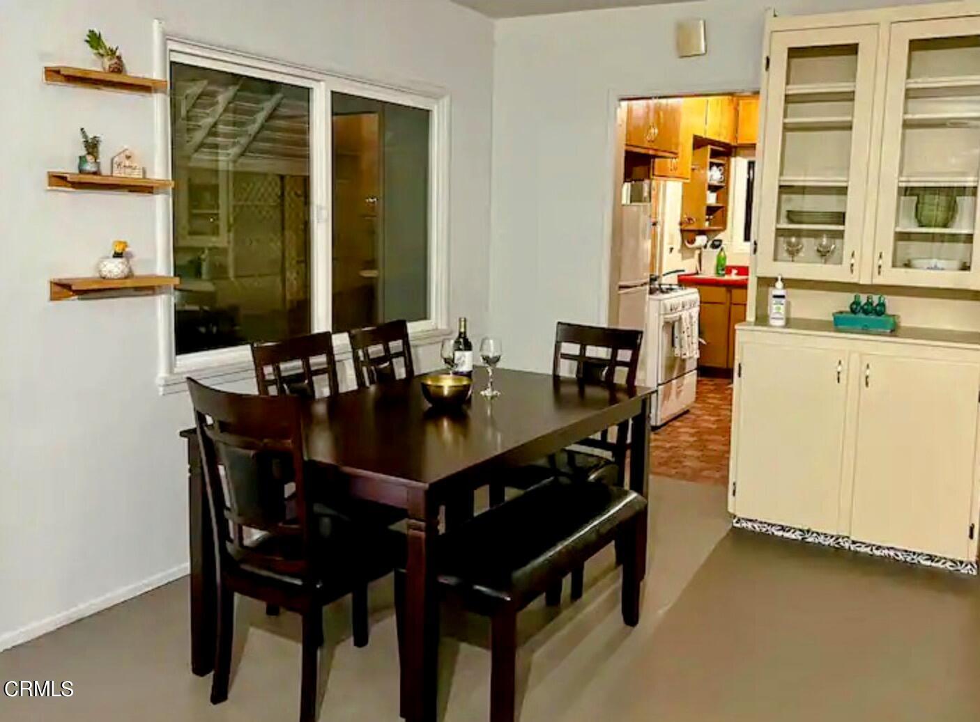 965 Jane Place Pasadena, CA 91105 - Photo 4 of 10 a view of a dining room with furniture and window