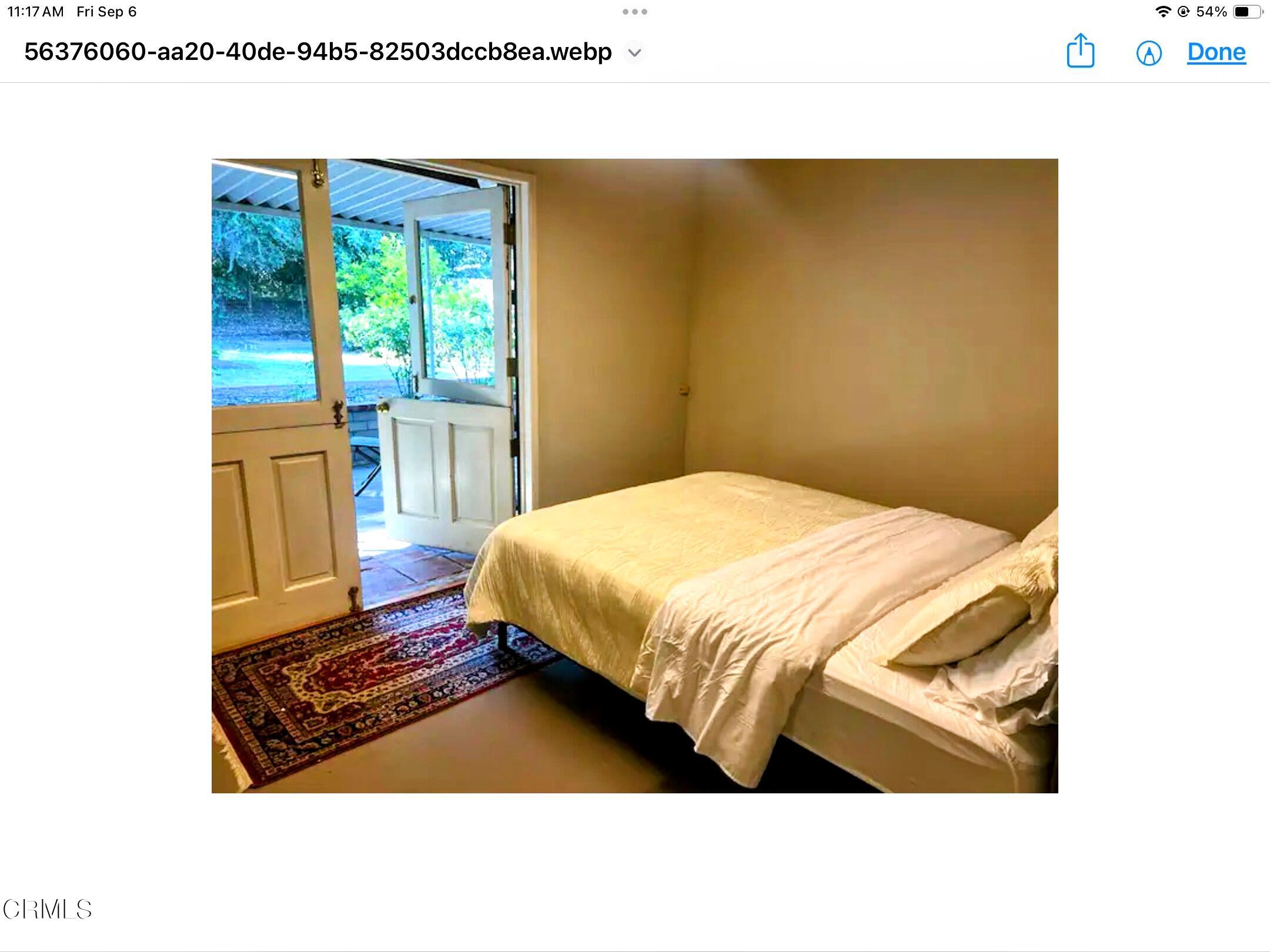965 Jane Place Pasadena, CA 91105 - Photo 6 of 10 a bed room with a bed window and a table