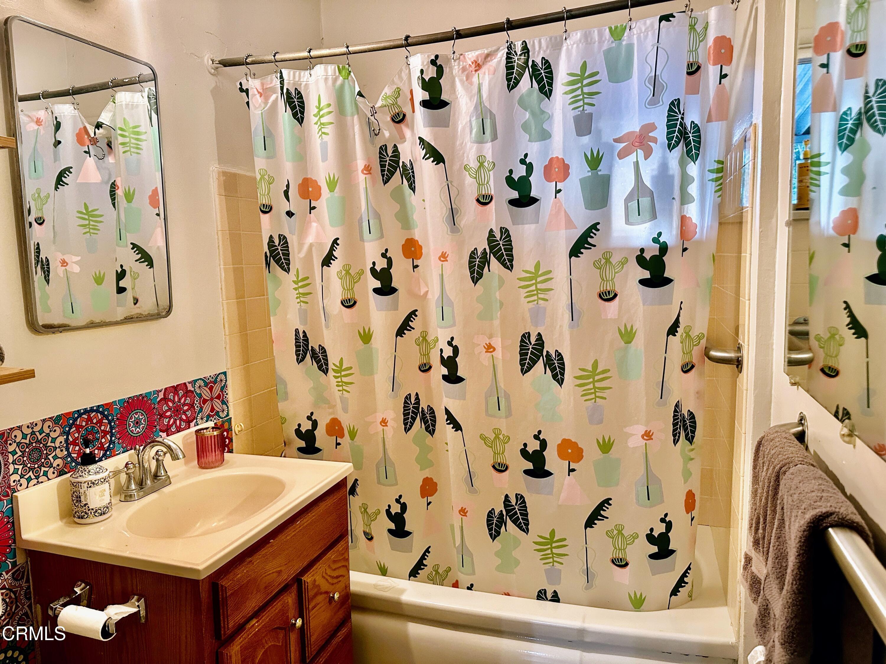 965 Jane Place Pasadena, CA 91105 - Photo 9 of 10 a bathroom with a sink and a mirror