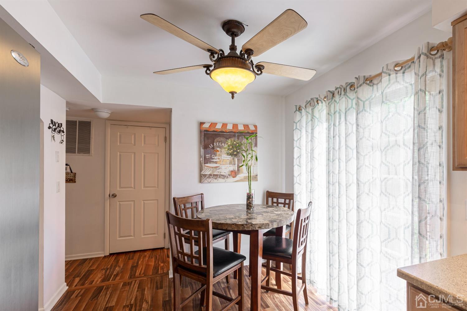 4 Hanover Square Middlesex, NJ 08846 - Photo 7 of 15 a view of a dining room with furniture and window