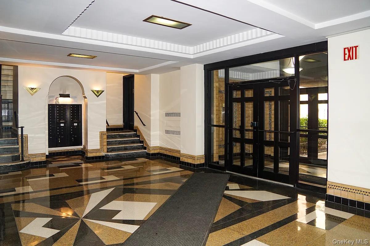 95 Park Terrace East, Unit 1D Manhattan, NY 10034 - Photo 12 of 20 Community lobby with stairway