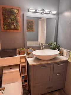 7200 Northwest 2nd Avenue, Unit 87 Boca Raton, FL 33487 - Photo 14 of 17 a bathroom with a sink and a mirror