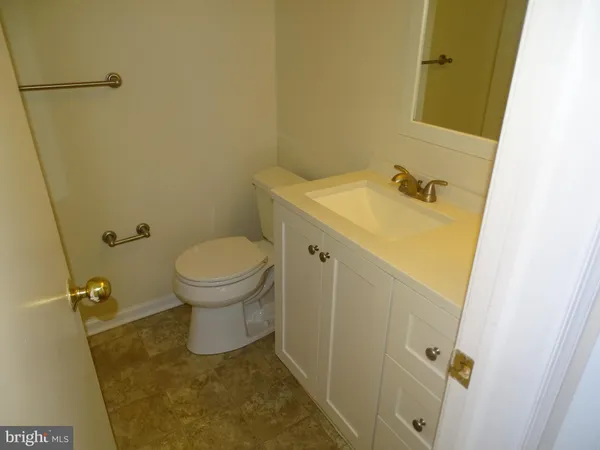 a bathroom with a sink and a toilet