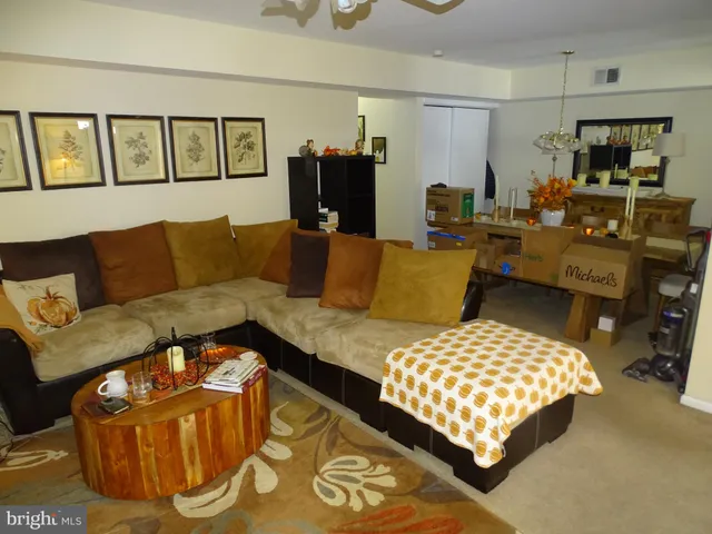 a living room with furniture and a couch
