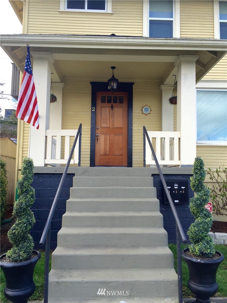 3302 Rucker Avenue Everett, WA 98201 - Photo 2 of 22 a front view of a house with entryway and windows