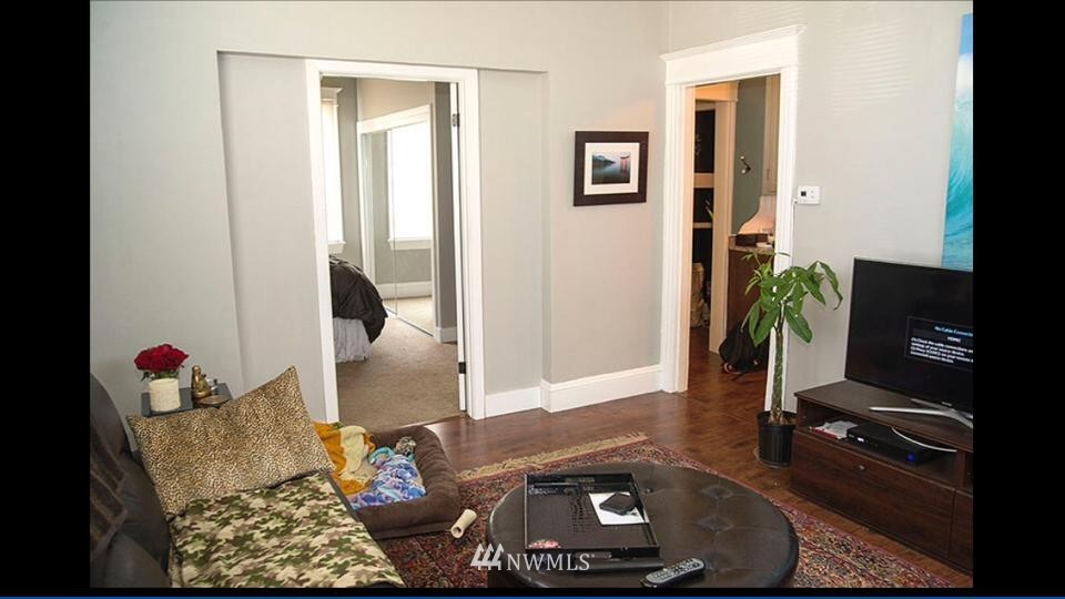 3302 Rucker Avenue Everett, WA 98201 - Photo 11 of 22 a living room with furniture and a window