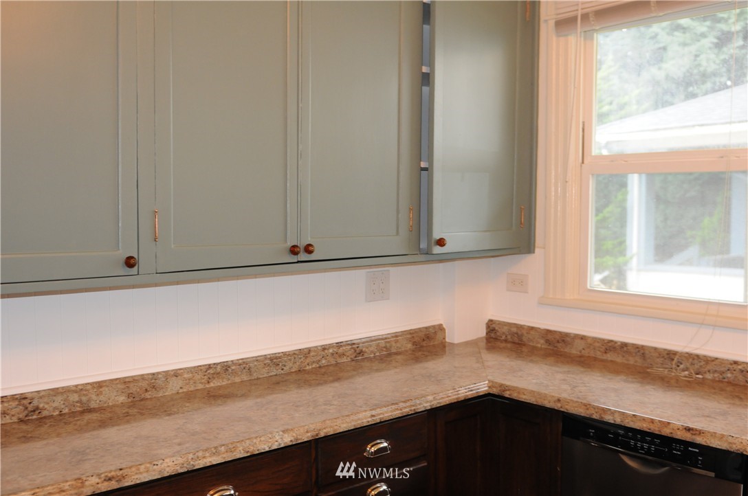 3302 Rucker Avenue Everett, WA 98201 - Photo 12 of 22 a view of cabinets and window