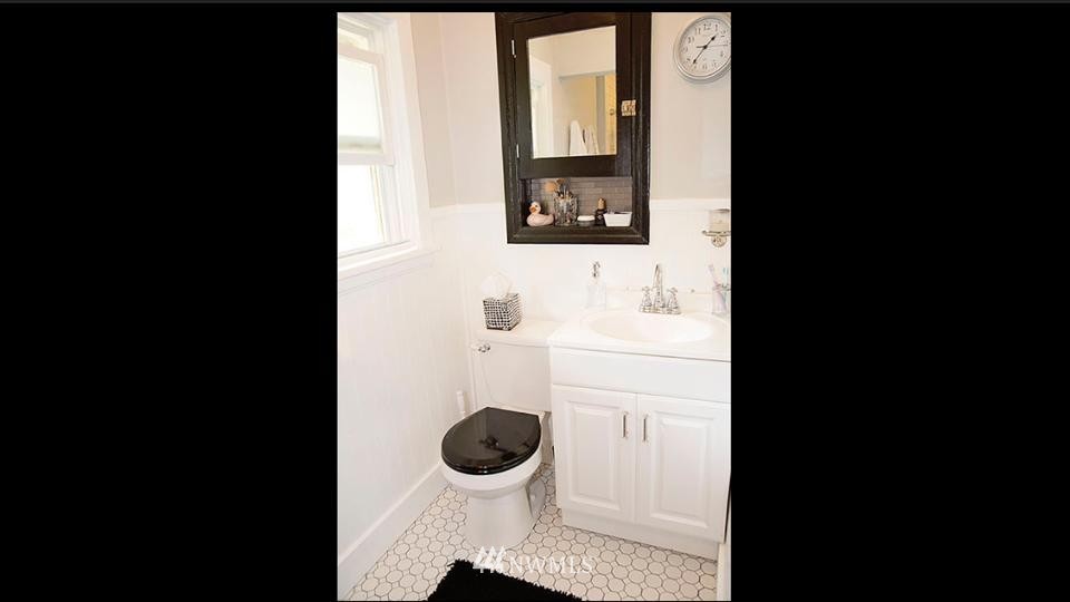 3302 Rucker Avenue Everett, WA 98201 - Photo 14 of 22 a bathroom with a toilet and a sink