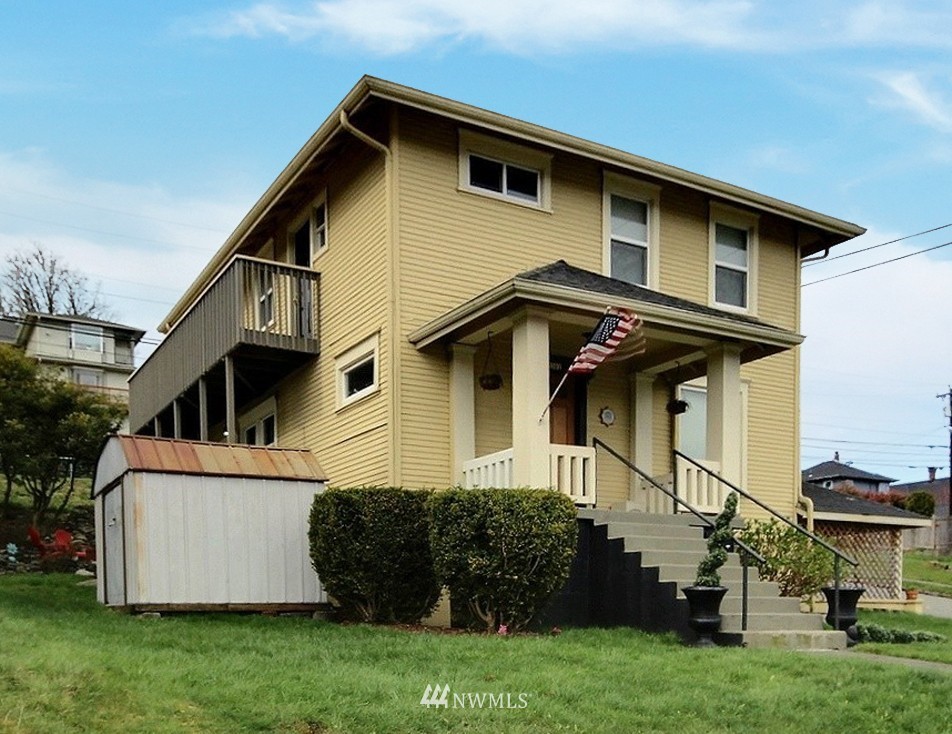 3302 Rucker Avenue Everett, WA 98201 - Photo 21 of 22 a view of a house with a yard