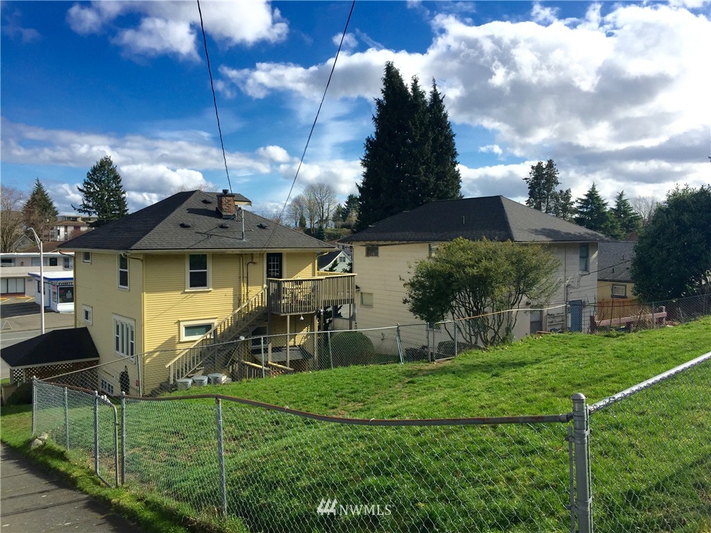 3302 Rucker Avenue Everett, WA 98201 - Photo 22 of 22 a front view of a house with garden