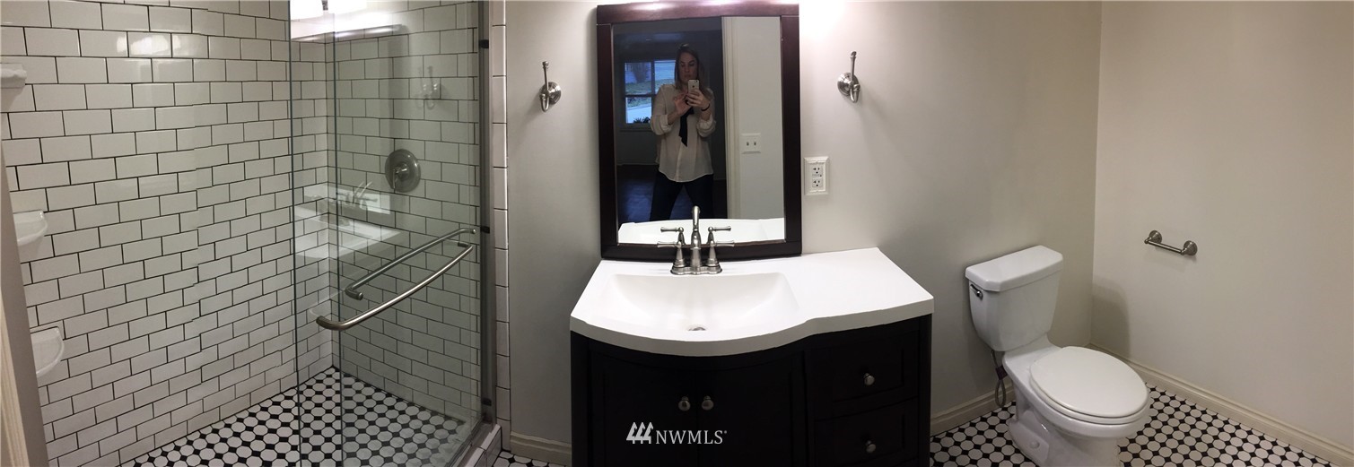 3302 Rucker Avenue Everett, WA 98201 - Photo 10 of 22 a bathroom with a sink toilet and shower