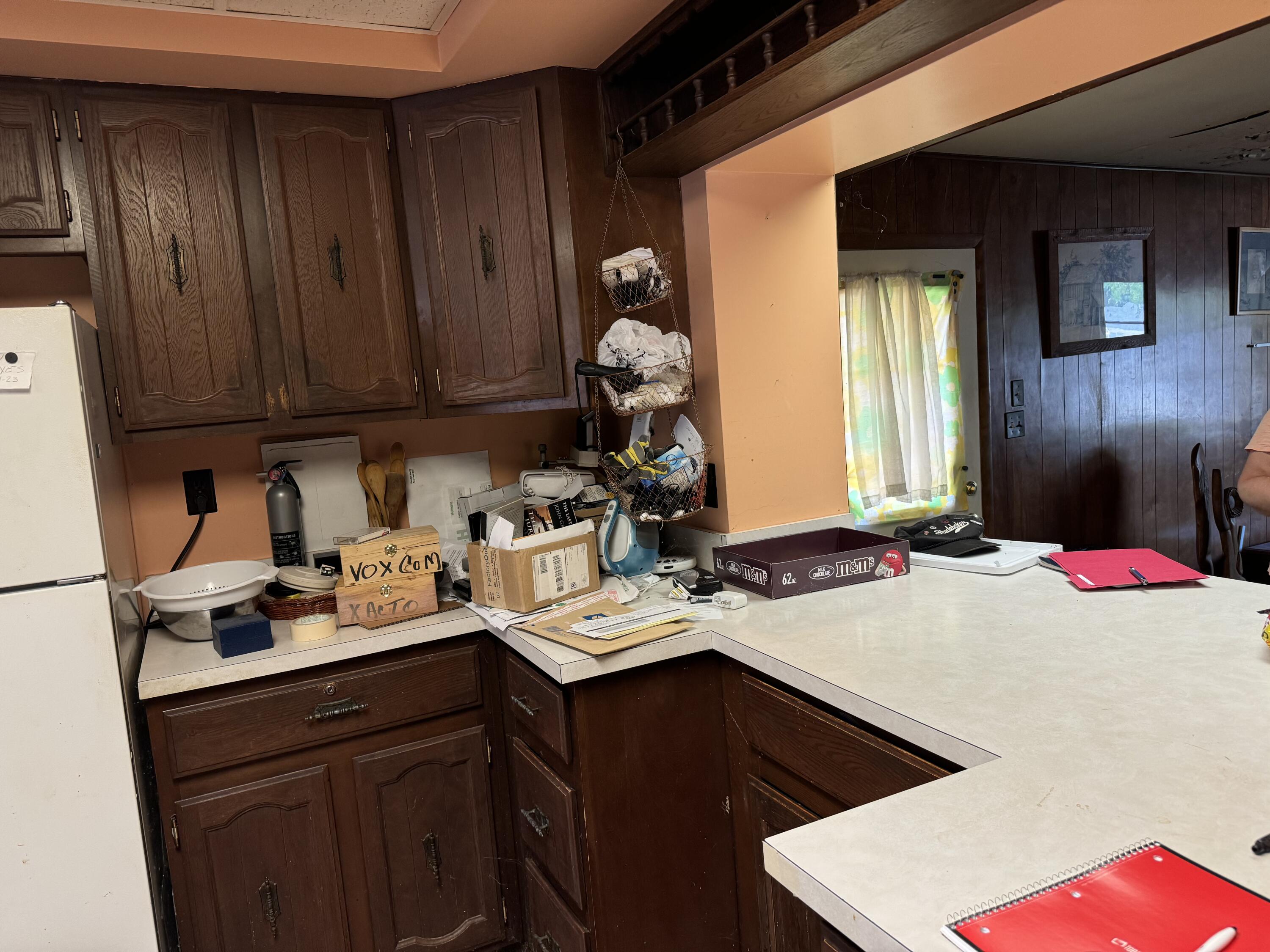 219 North Grant Street Crown Point, IN 46307 - Photo 12 of 17 a kitchen with a sink and cabinets