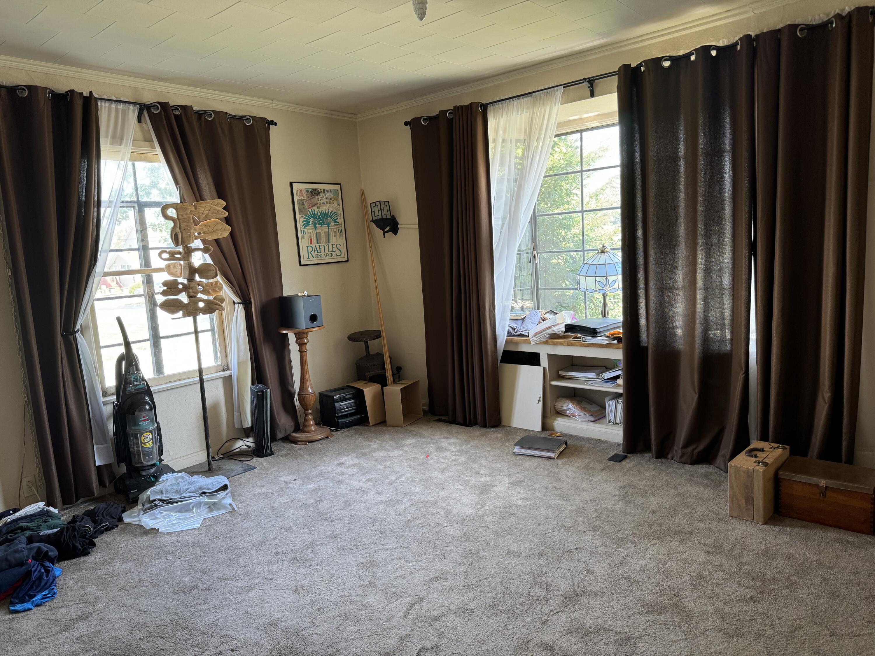 219 North Grant Street Crown Point, IN 46307 - Photo 6 of 17 a view of a room with gym equipment and a large window