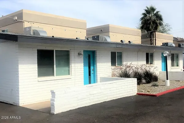 a front view of a house with a garage