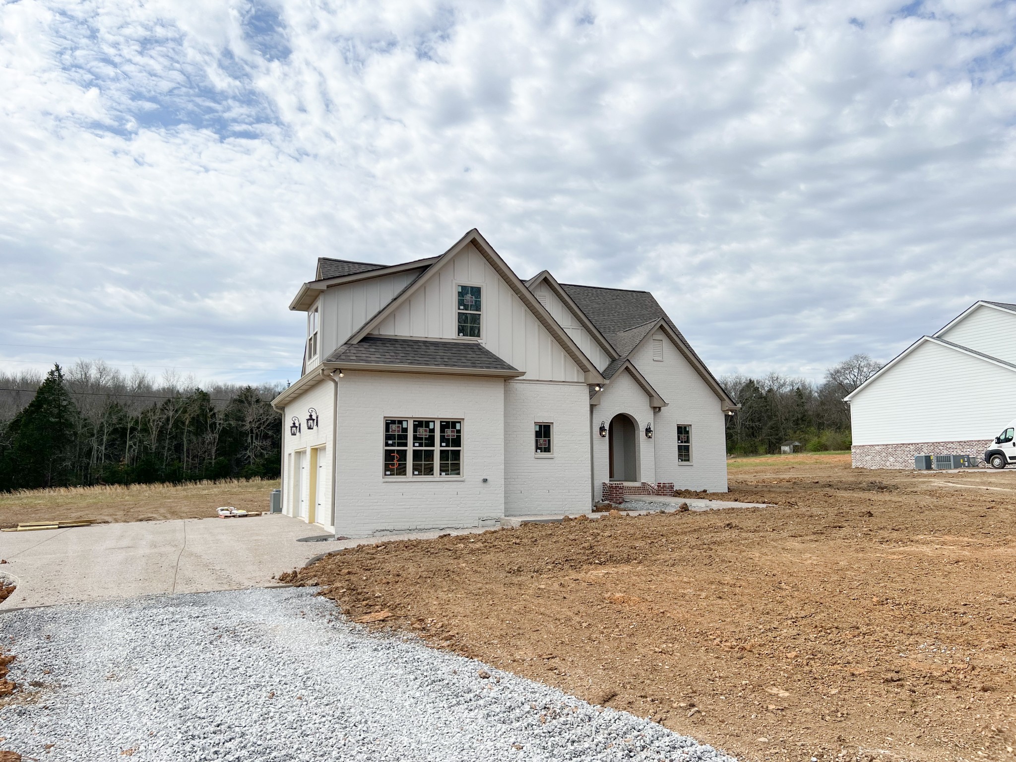 6575 Simmons Bluff Road Lebanon, TN 37090 - Photo 2 of 24 a view of a white house with a yard