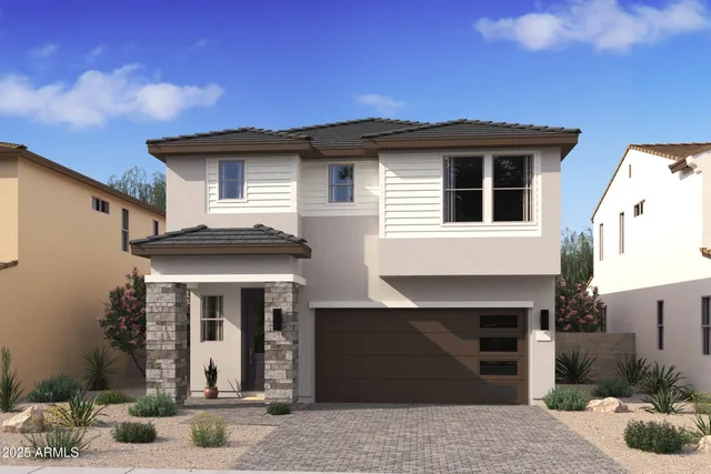 a front view of a house with yard