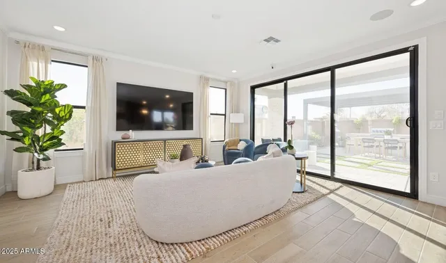 a dining room with furniture window wooden floor