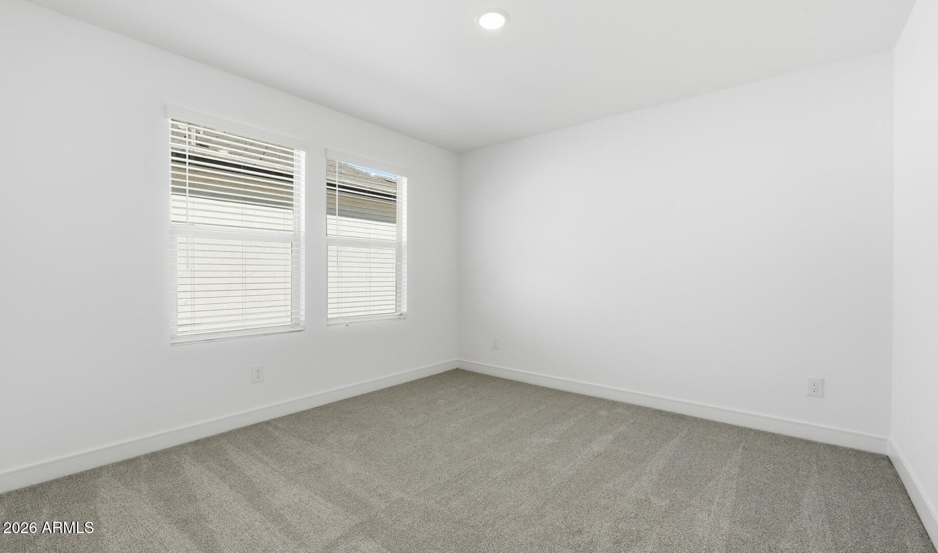 8010 West Royal Palm Road Peoria, AZ 85345 - Photo 16 of 34 an empty room with a window