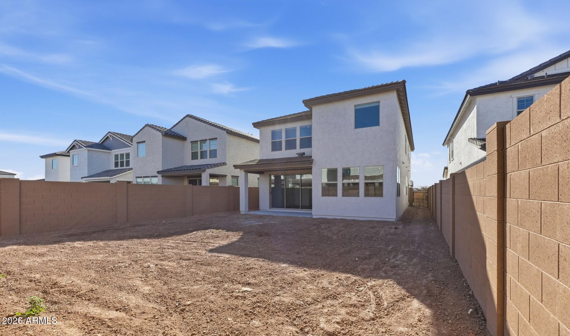 8010 West Royal Palm Road Peoria, AZ 85345 - Photo 23 of 34 a view of a house with a yard