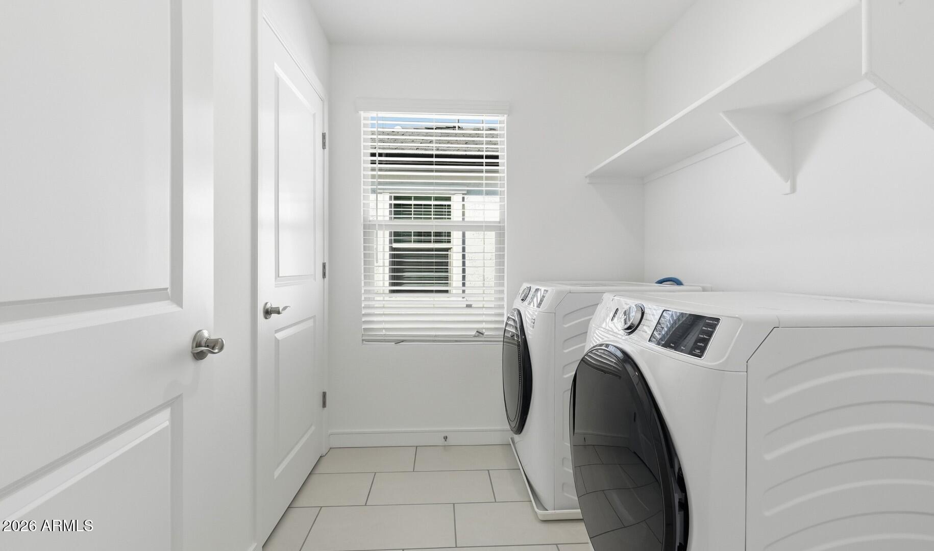 8010 West Royal Palm Road Peoria, AZ 85345 - Photo 30 of 34 a utility room with dryer and washer