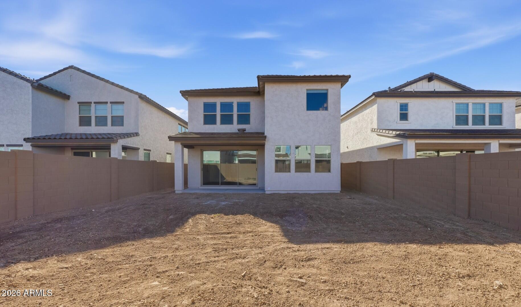 8010 West Royal Palm Road Peoria, AZ 85345 - Photo 31 of 34 a view of a house with a yard