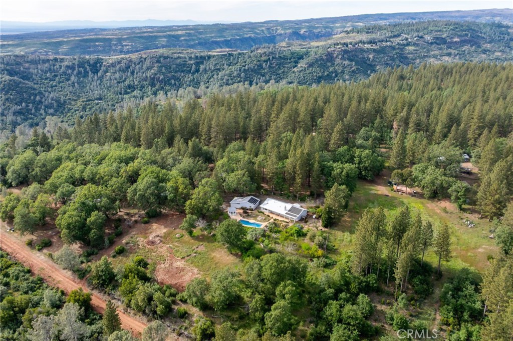 4620 Wendlis Road Forest Ranch, CA 95942 - Photo 11 of 50 a view of a lake with green field