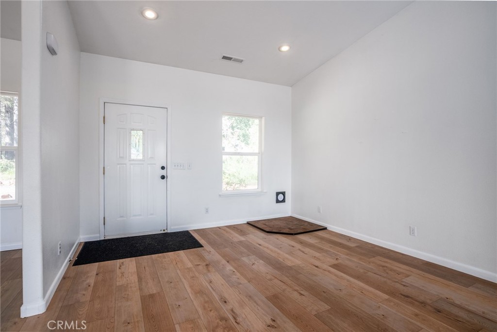4620 Wendlis Road Forest Ranch, CA 95942 - Photo 25 of 50 a bedroom with a bed and a window