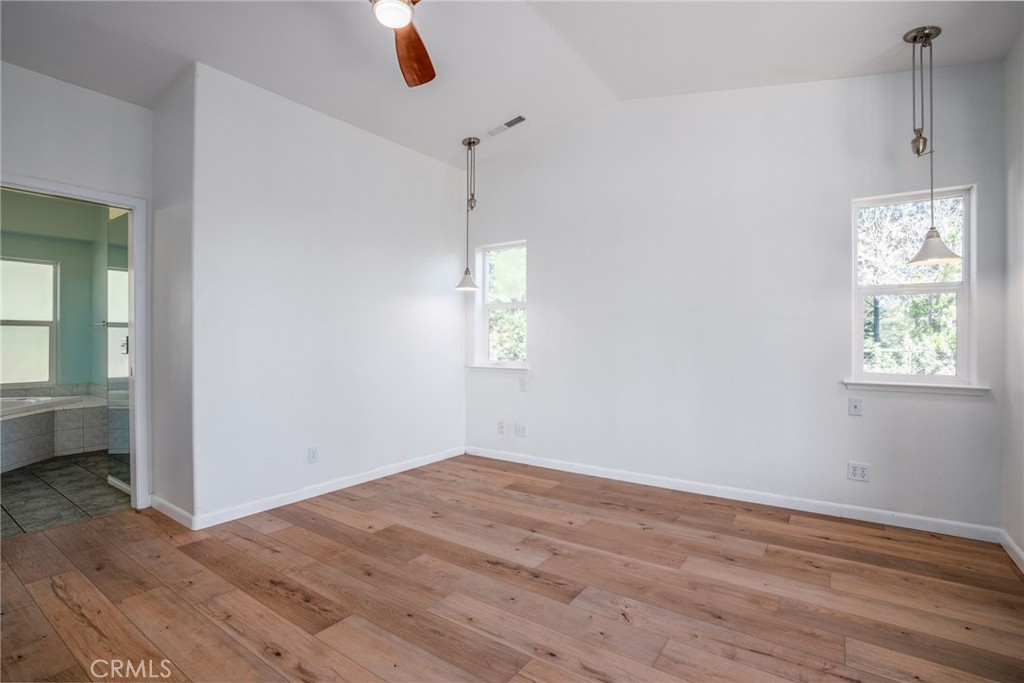 4620 Wendlis Road Forest Ranch, CA 95942 - Photo 28 of 50 wooden floor in an empty room with a window