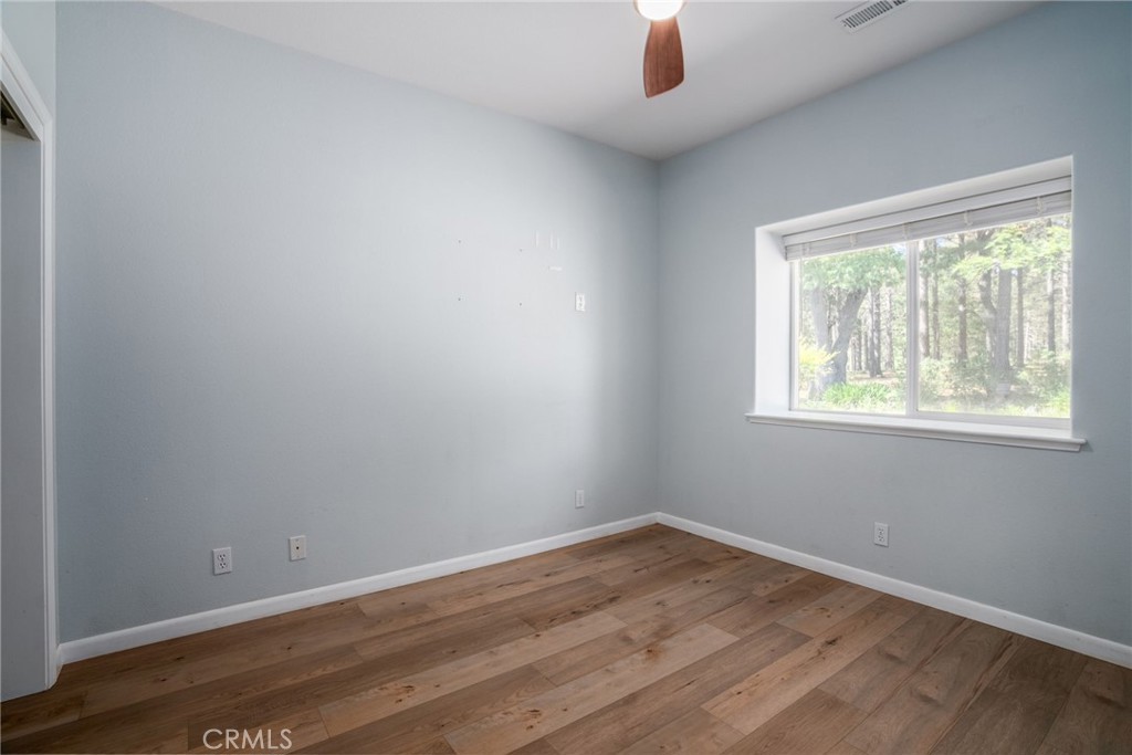 4620 Wendlis Road Forest Ranch, CA 95942 - Photo 31 of 50 wooden floor in an empty room with a window