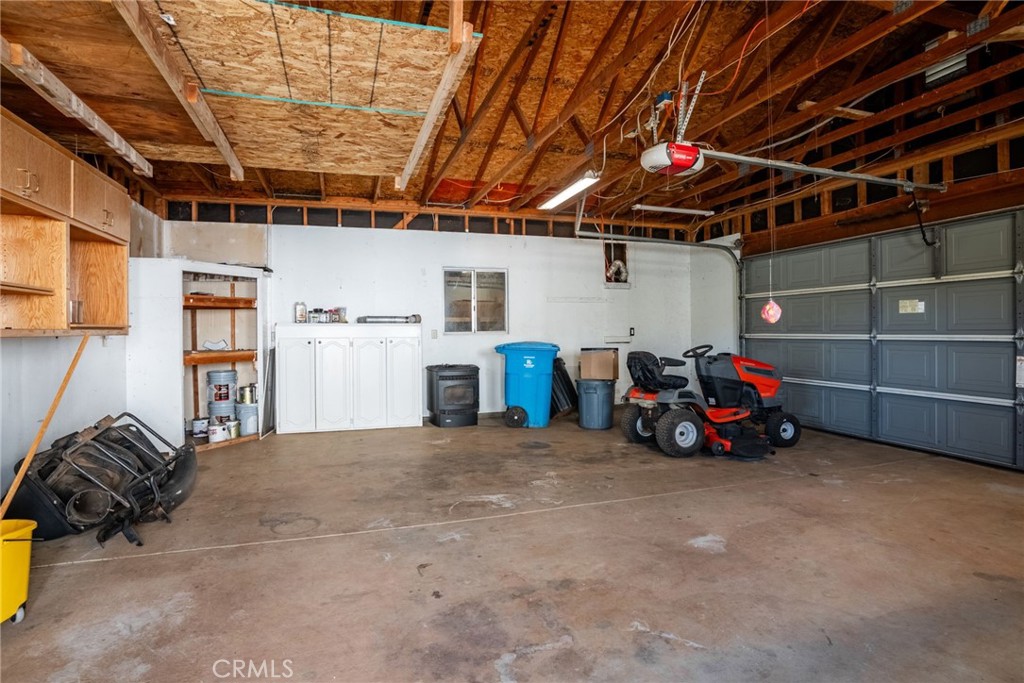 4620 Wendlis Road Forest Ranch, CA 95942 - Photo 42 of 50 a view of a garage with storage and utility