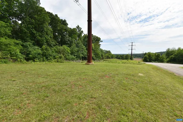 a view of a house with a big yard